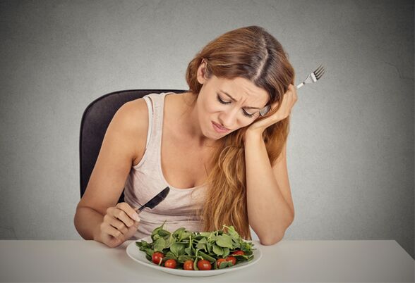 Girl eats greens on a Mediterranean diet
